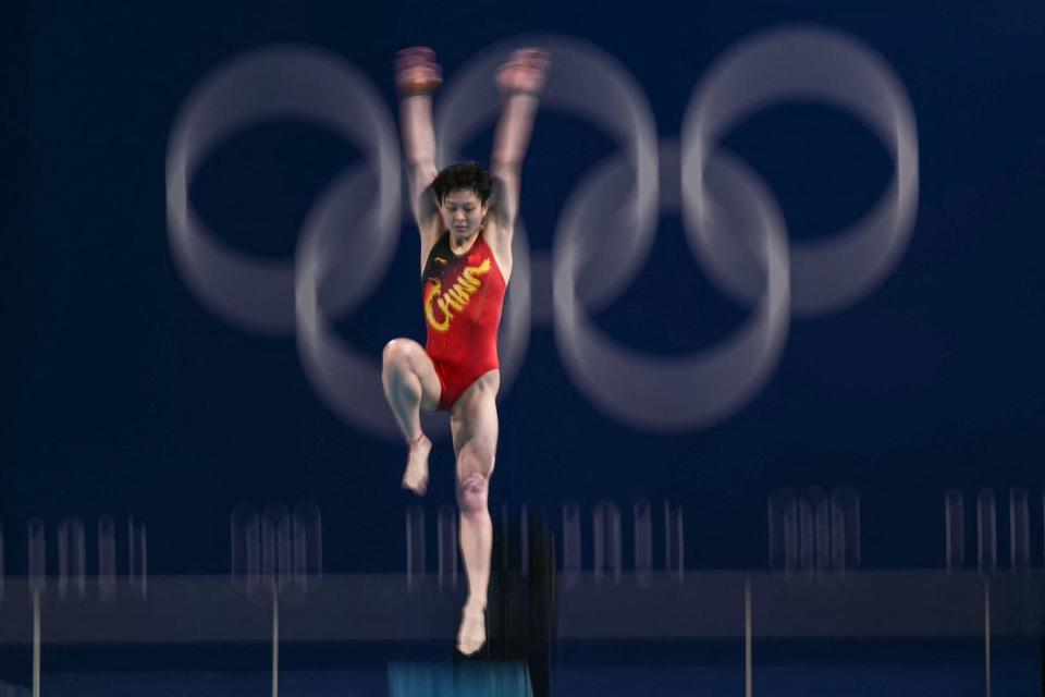 运动员在跳水比赛中拿下金牌(运动员在跳水比赛中拿下金牌犯规吗) 运动员在跳水比赛中拿下金牌(运动员在跳水比赛中拿下金牌犯规吗)